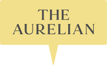 Text reading THE AURELIAN inside a yellow speech bubble with a pointed tail at the bottom.