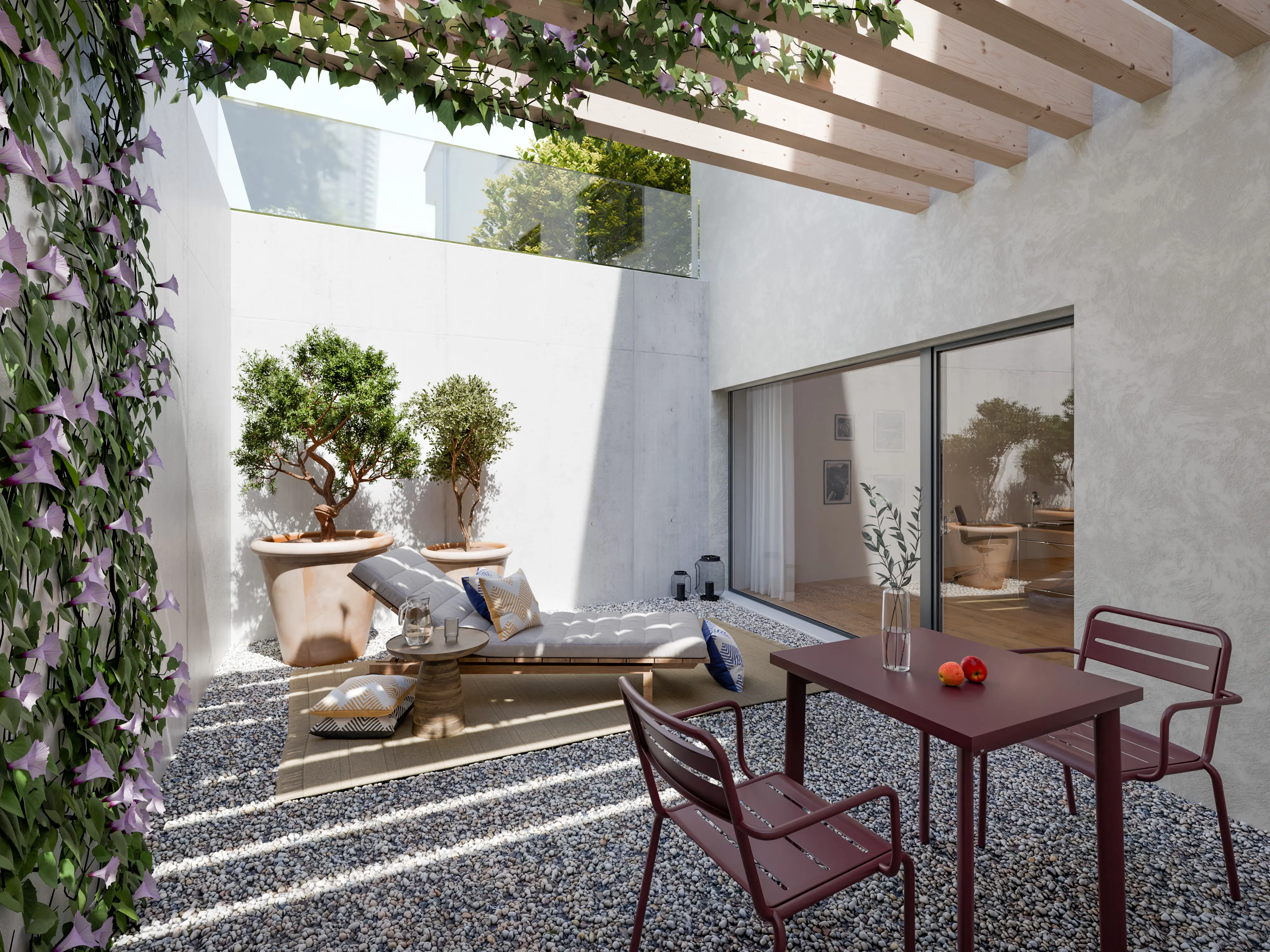 Terrasse moderne avec chaise longue, table rouge avec deux chaises, plantes en pot et mur végétal fleuri.