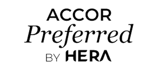 Text logo reading 'ACCOR Preferred by HERA' on a white background.