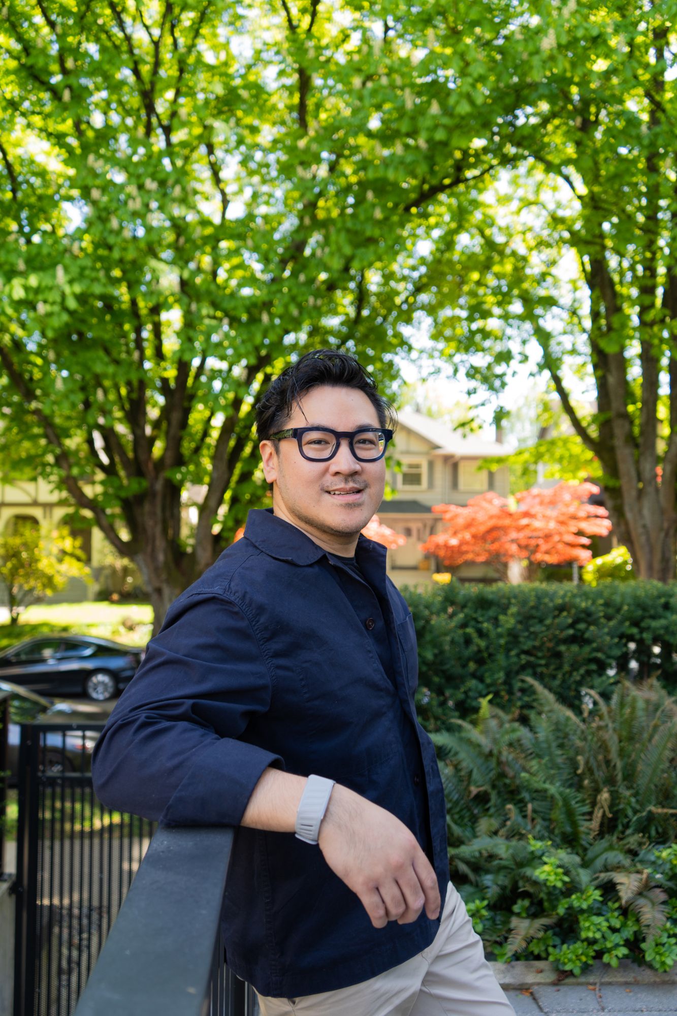 Jeff, travel designer at Travel Designer Vancouver, smiling outdoors on a leafy Vancouver street