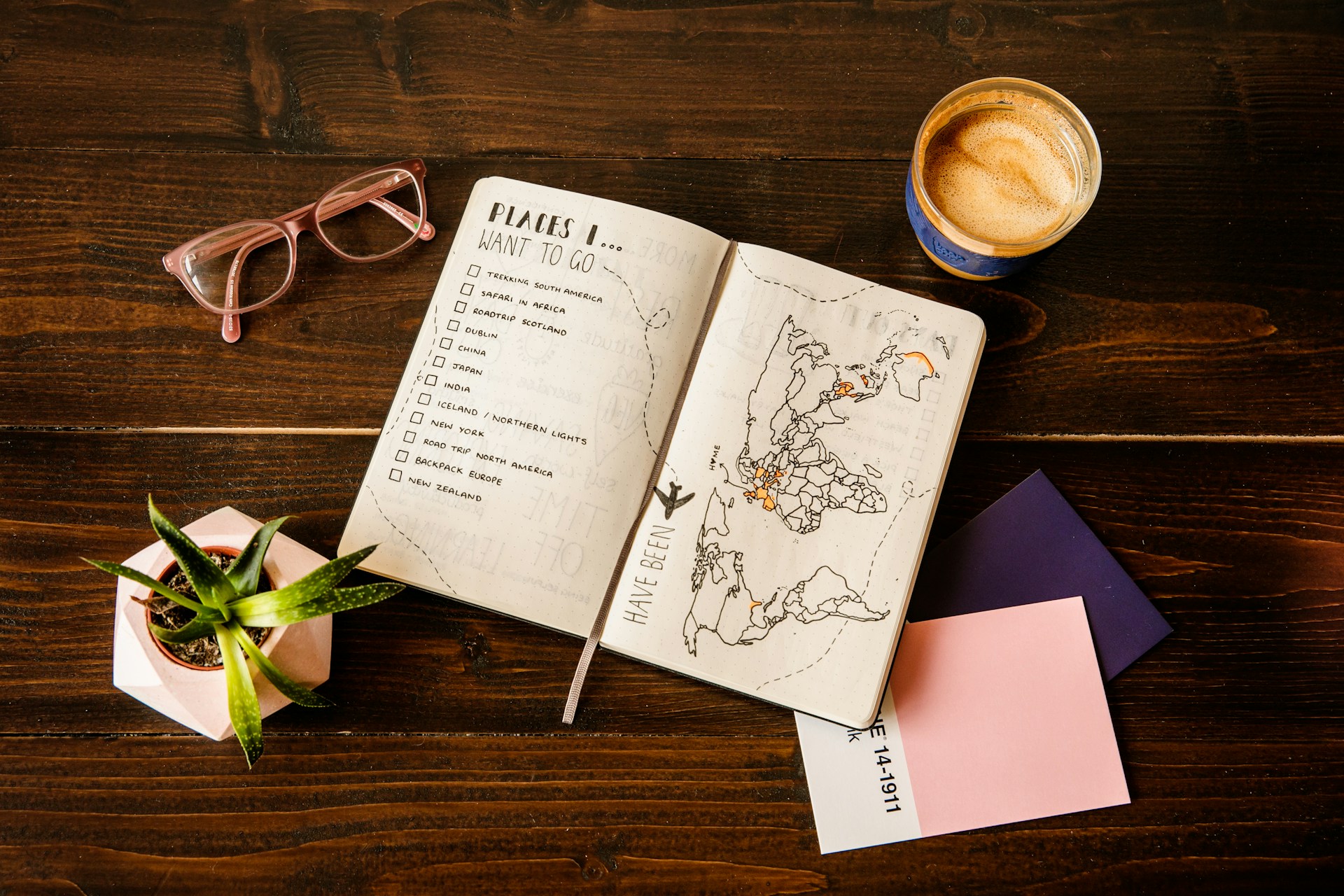 Busy professional reviewing a curated travel itinerary on a laptop in a modern setting