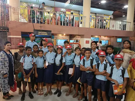 Students on an educational visit to a science planetarium
