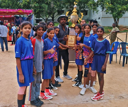 School students receiving recognition during a sports event