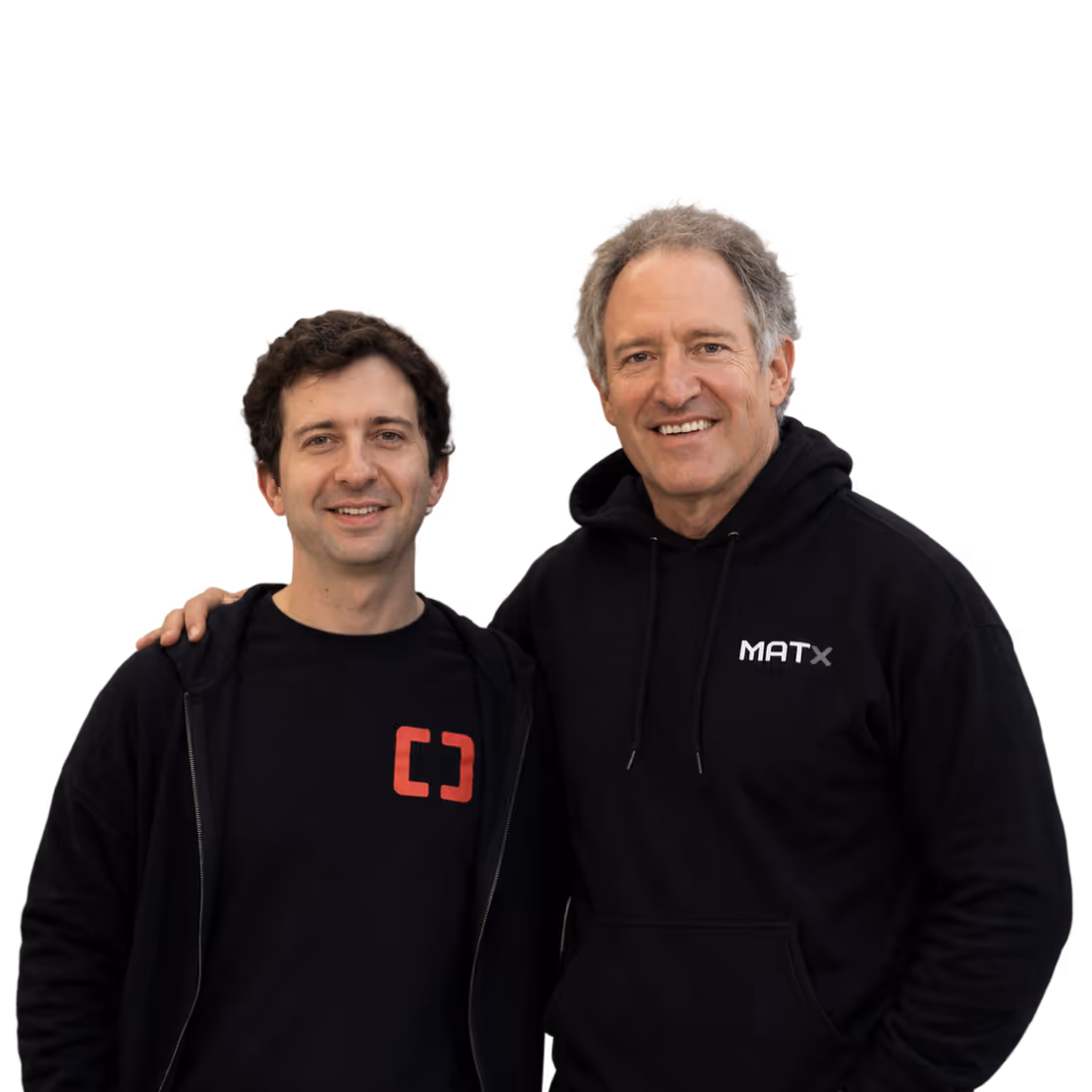 Two men smiling, one wearing a black hoodie with MATX logo and the other wearing a black shirt with a red logo.