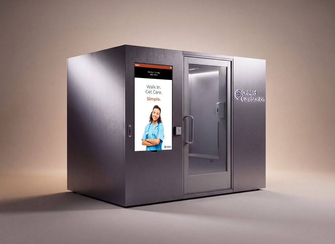 OnMed CareStation product render, an 8x10 Clinic-in-a-Box with a walk-in glass door and digital display reading "Walk In. Get Care. Simple.".