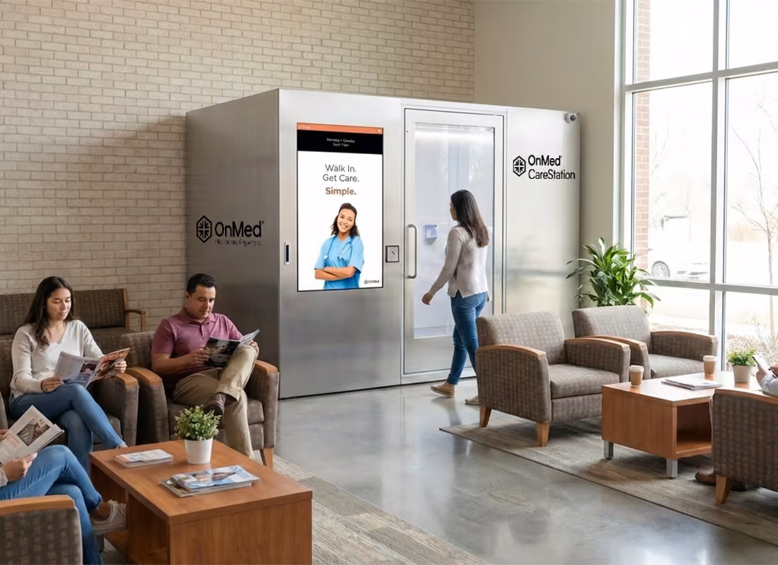 OnMed CareStation® with a "Walk In. Get Care. Simple." screen in a hospital waiting area as a woman approaches the door and patients read nearby