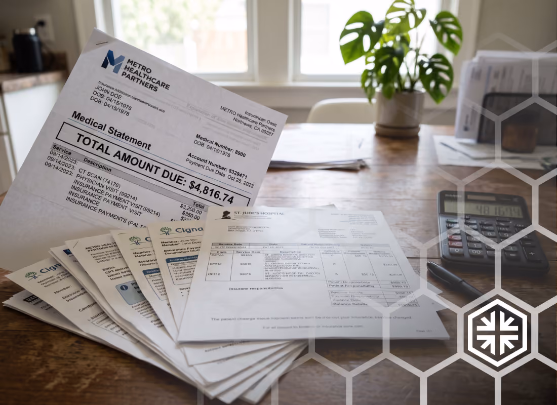 Fanned stack of medical bills and insurance statements on a wooden table beside a calculator, with a total amount due of $4,816.74 visible