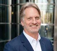 A headshot of Jim Miller, CTO of SignpostAI