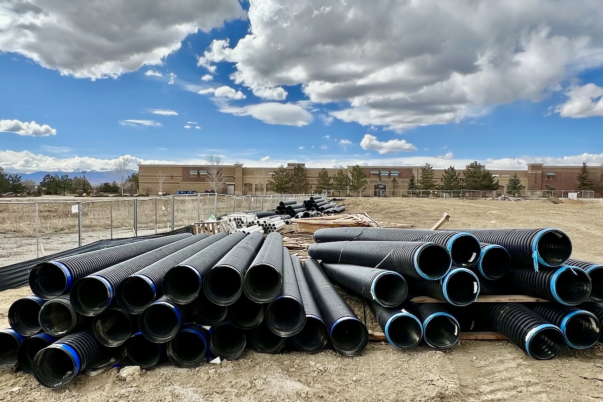 Underground storm and sanitary pipe installation at Notch 66 multifamily development, Longmont Colorado