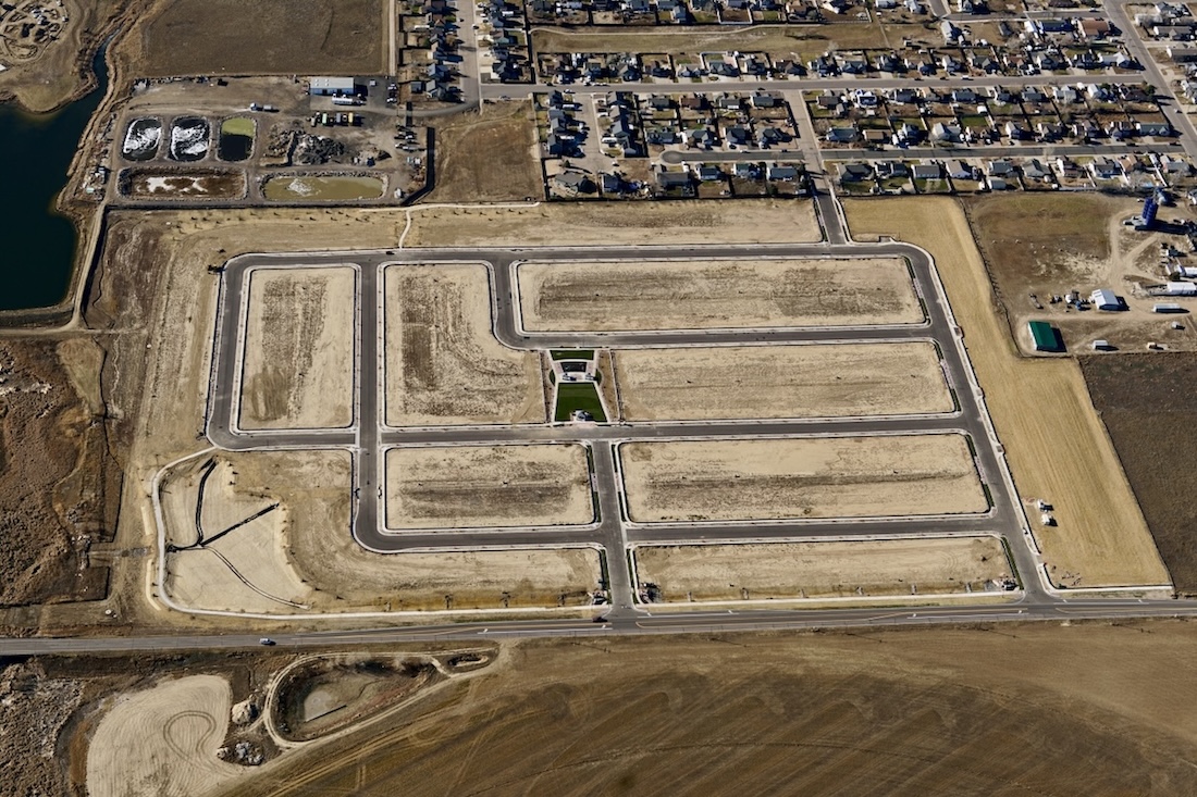 Aerial drone view of Summerfield North residential subdivision under construction, Keenesburg Colorado