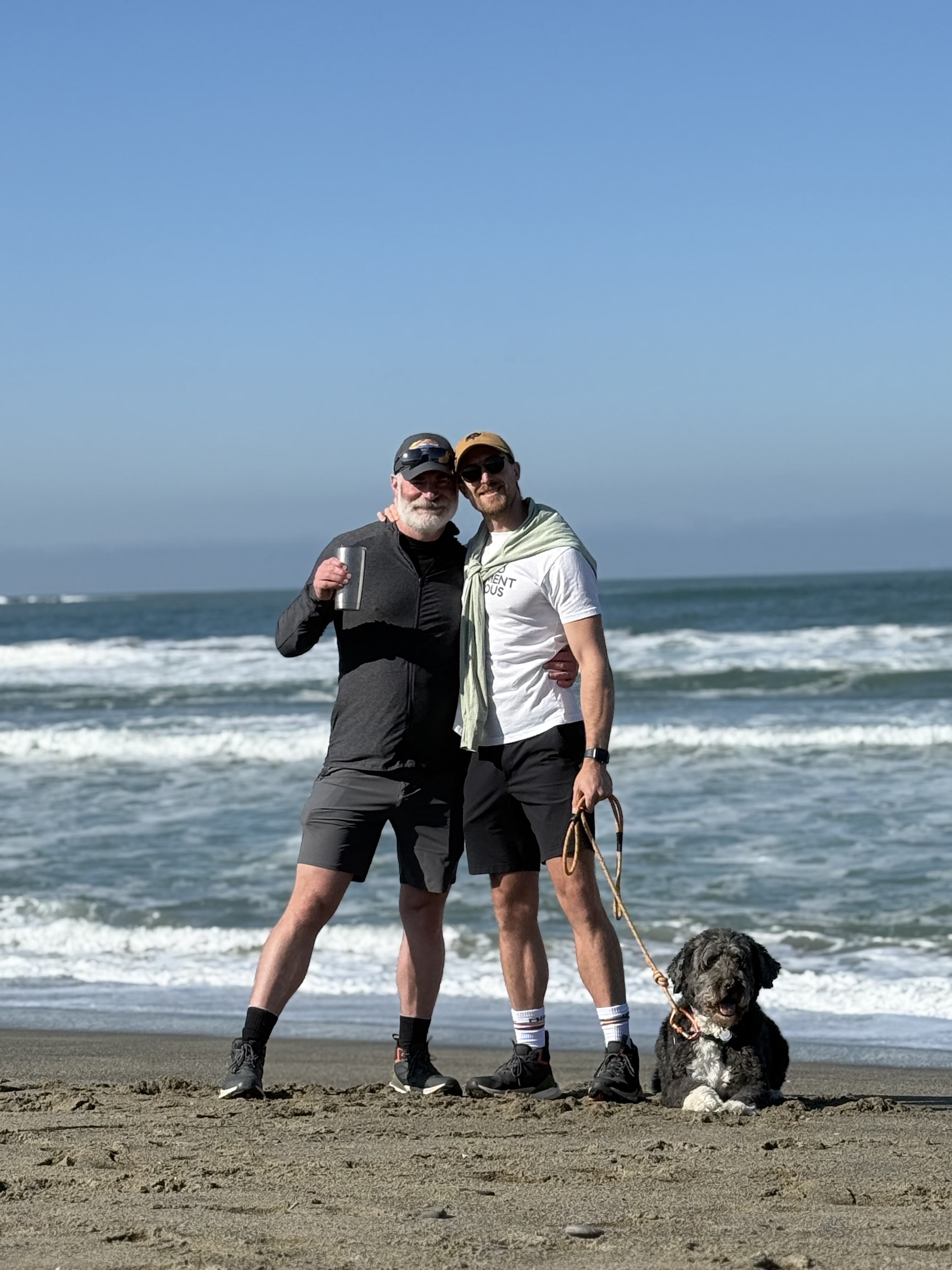 Jeremy with David and Cooper on the beach in Pacifica, California.