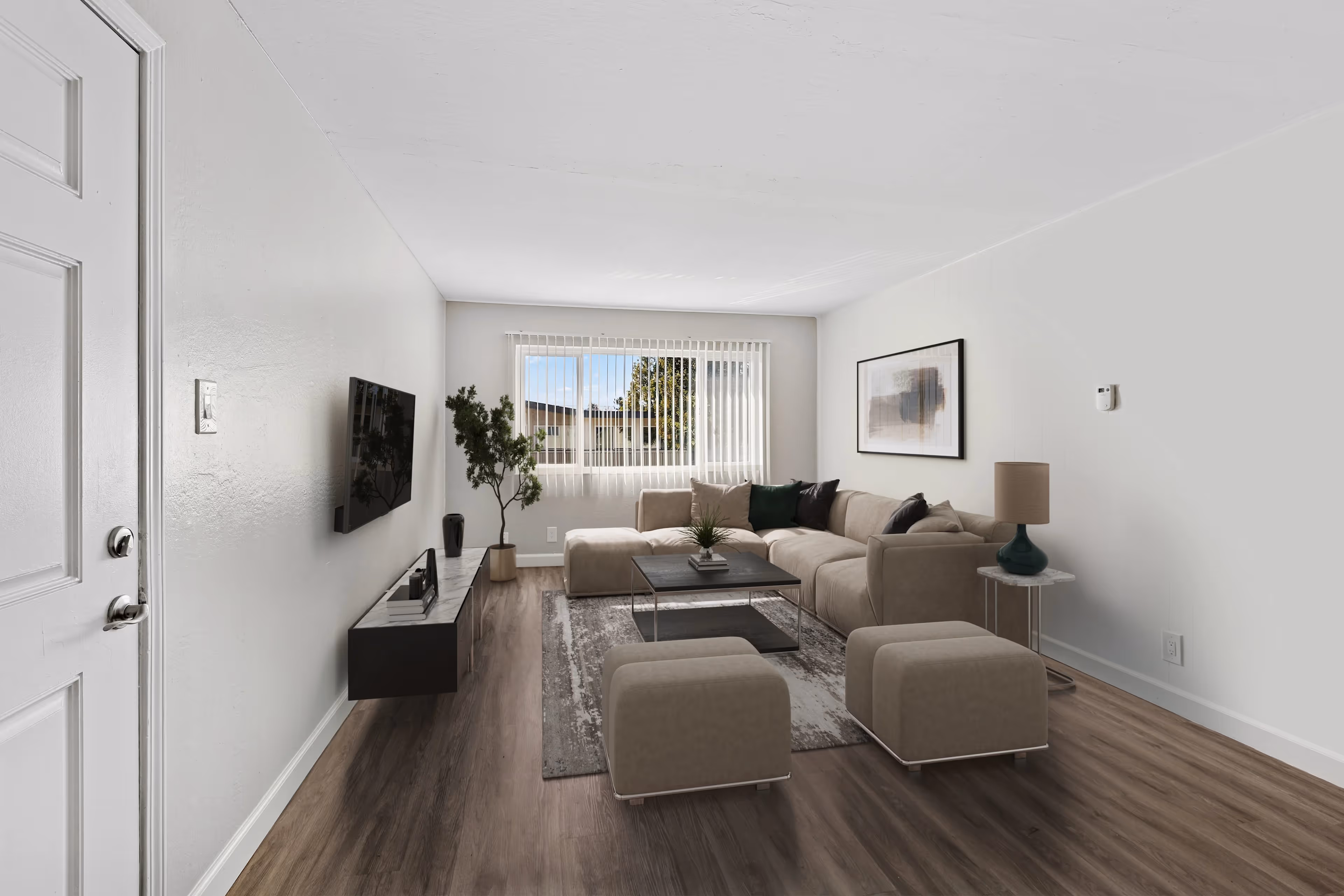 Living area with sofa, coffee table, and tv