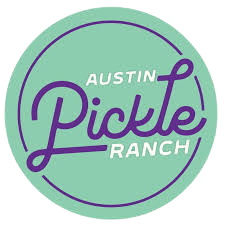 Austin Pickle Ranch logo with stylized purple text on a green circular background.