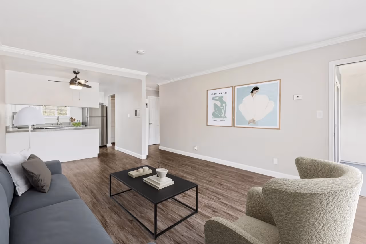 Living area with sofa, coffee table, and tv