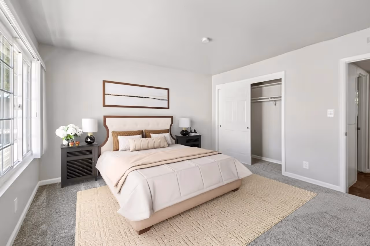 Bedroom with bed and large window