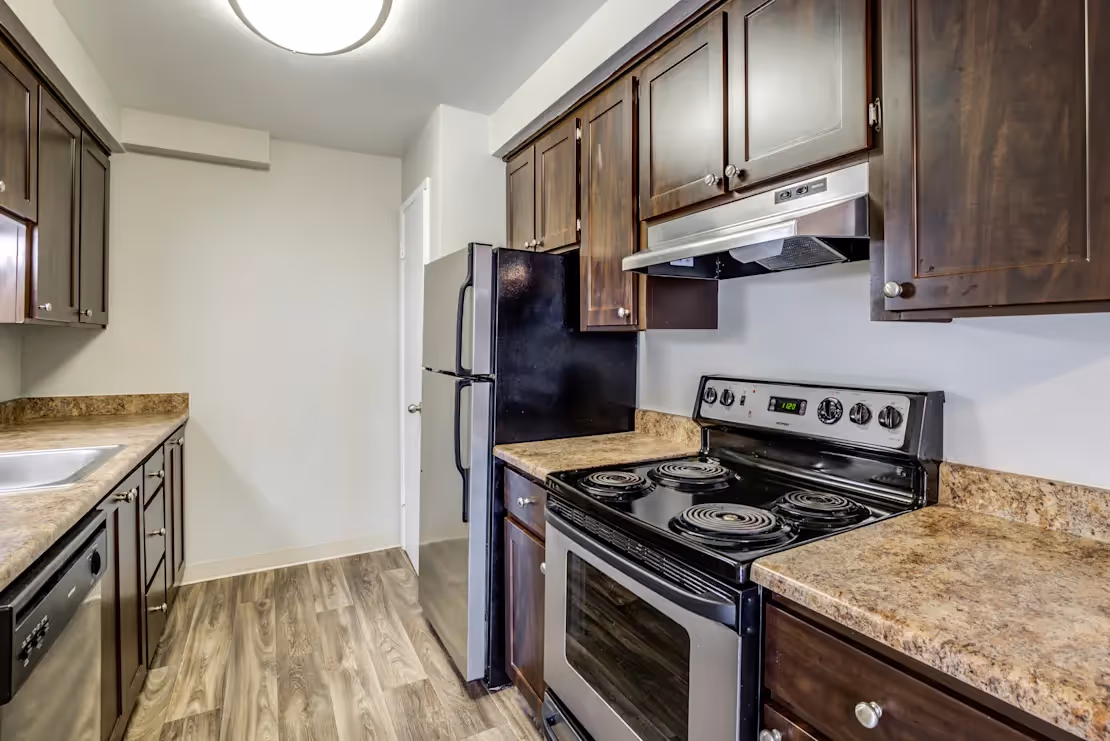 Kitchen with brown cabinets