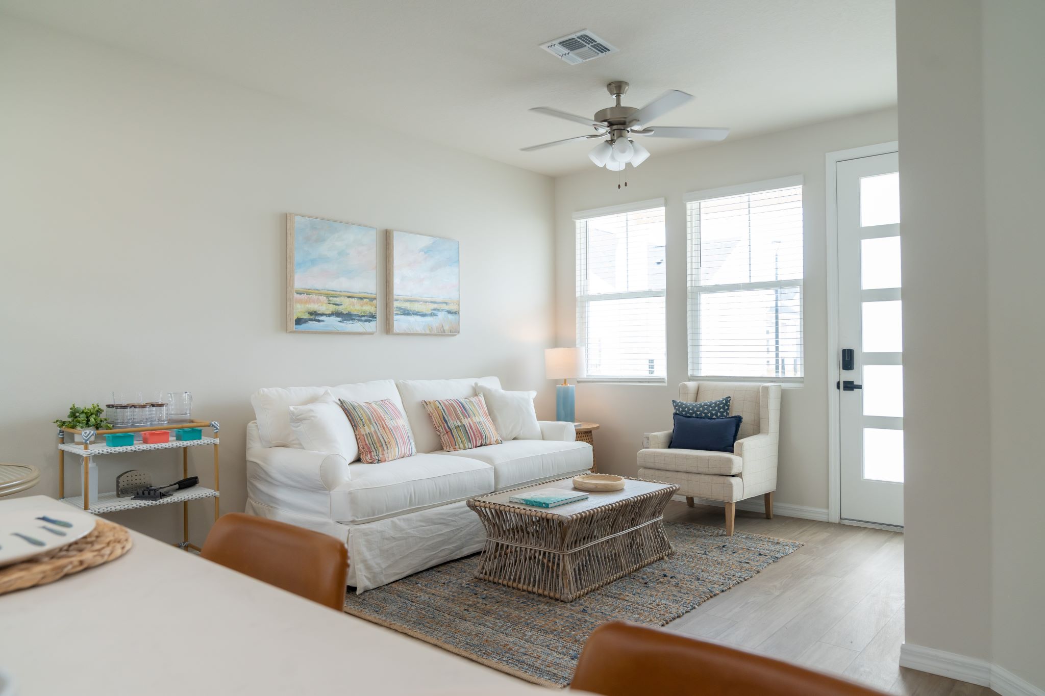 3D Rendering of furnished living area with view of kitchen