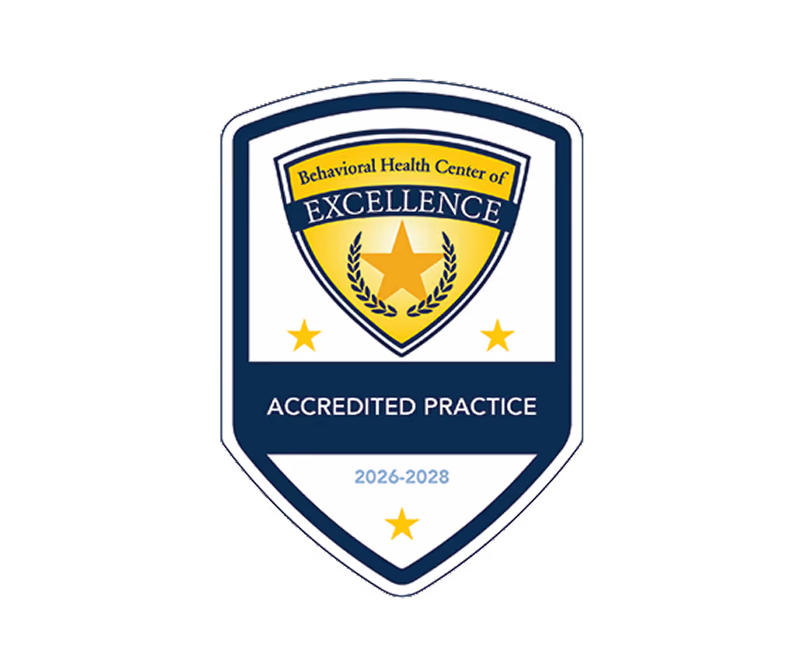 Behavioral Health Center of Excellence badge showing accredited practice for 2026-2028 with three gold stars.