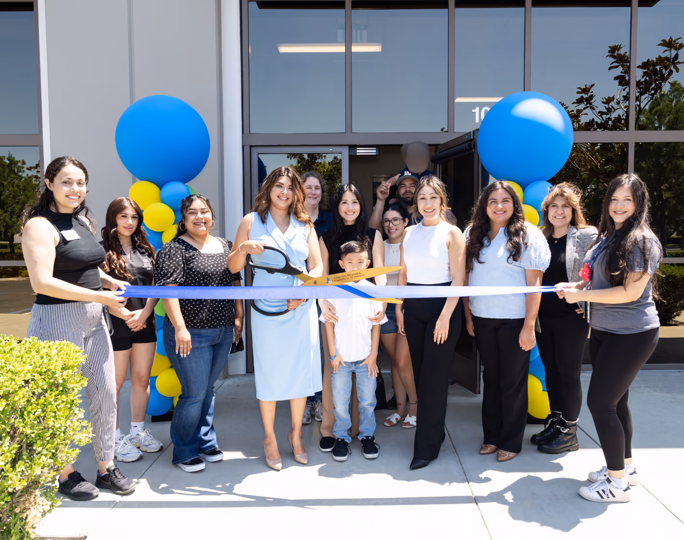 RIV-C03 Grand Opening group photo (1).png