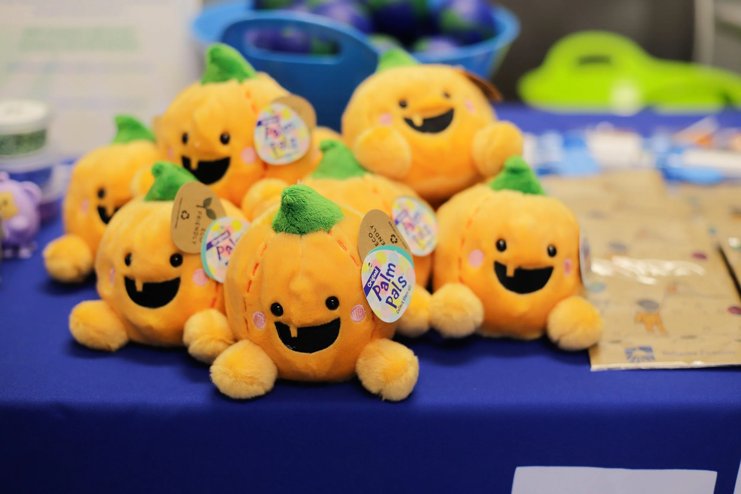 Pumpkin plushie toy for kids during grand opening at Behavior Frontiers autism care center