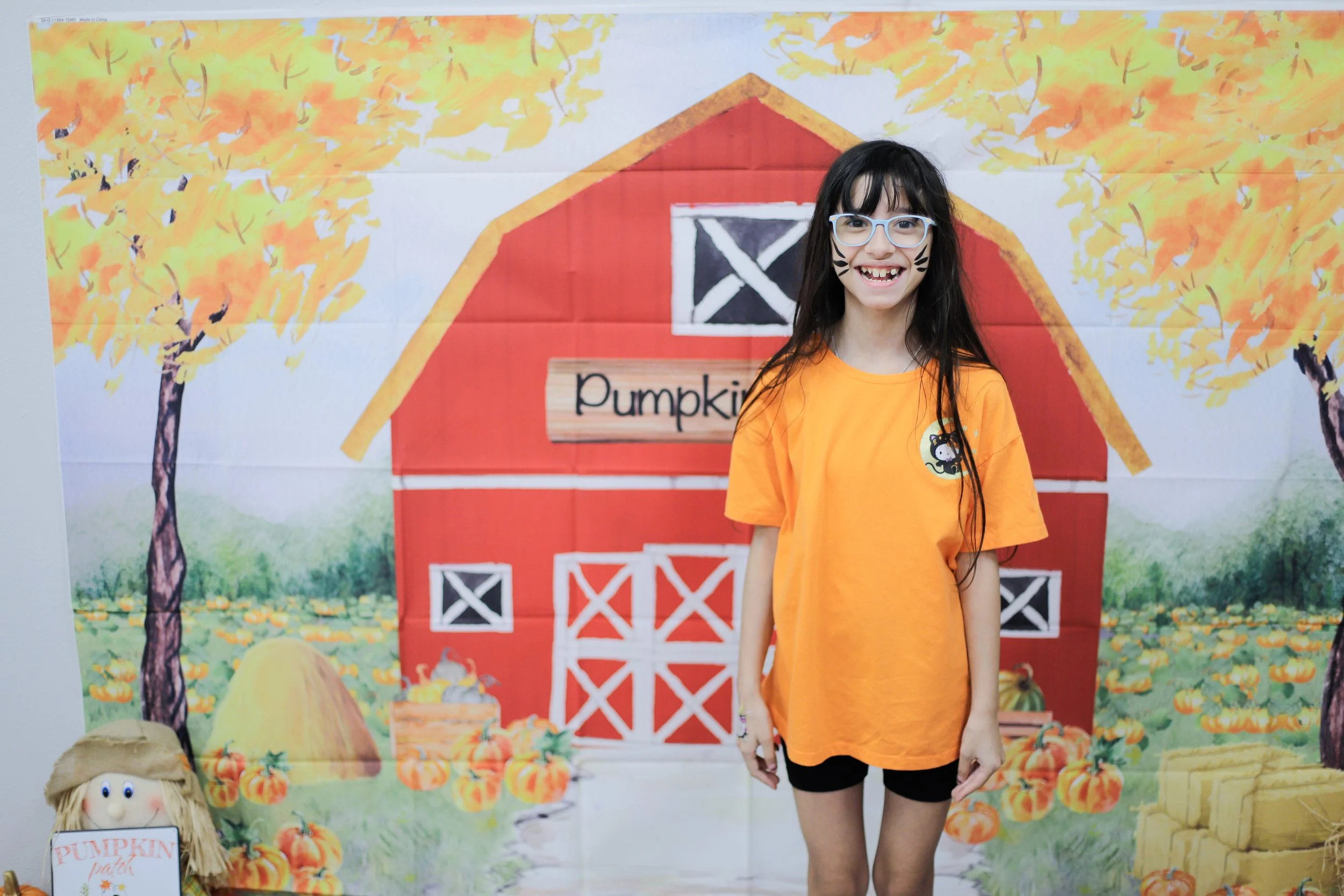 Welcome sign and fall decorations at Behavior Frontiers autism care center grand opening