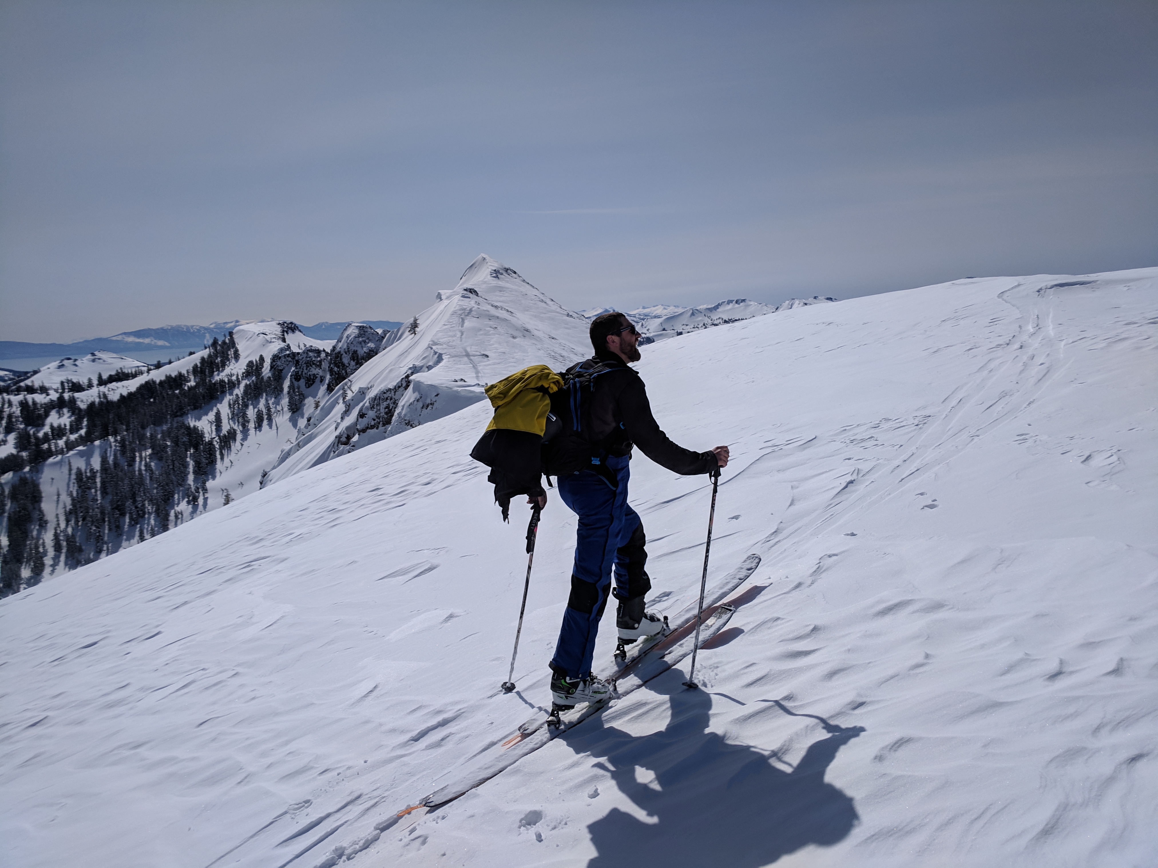 Skier hiking to summit
