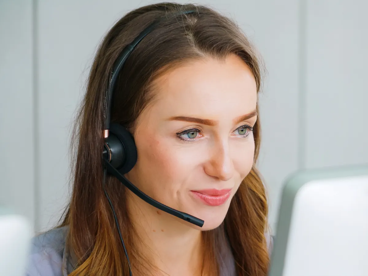 EOS Health support team member wearing a headset