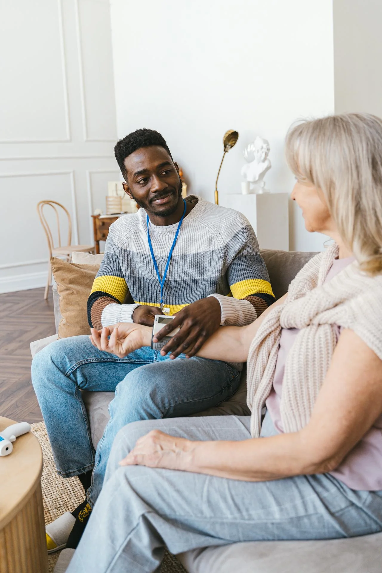 A SadieGrace support worker checking on an older participant in her home