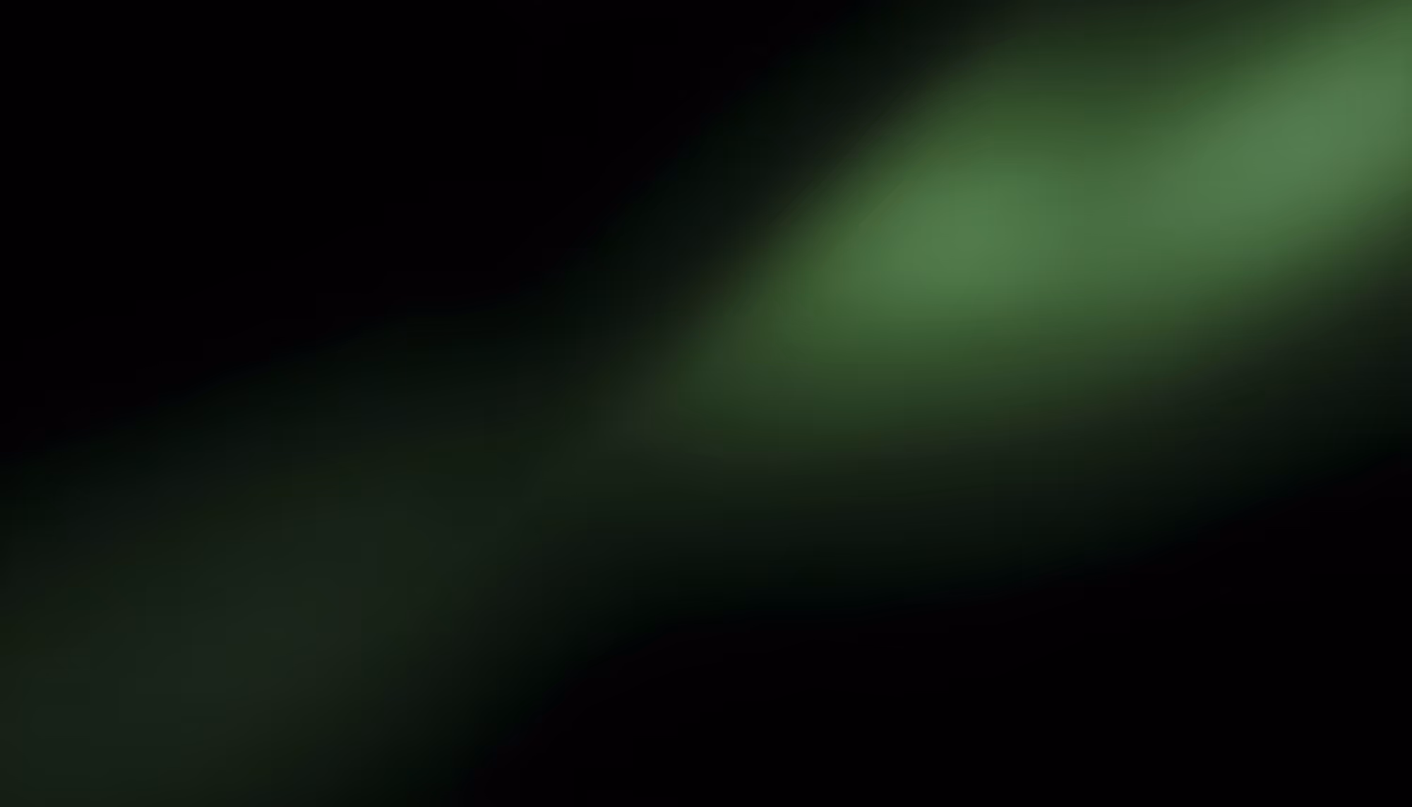 Abstract dark background with soft glowing green light concentrated in the upper right area, fading diagonally into deep black on the lower left.