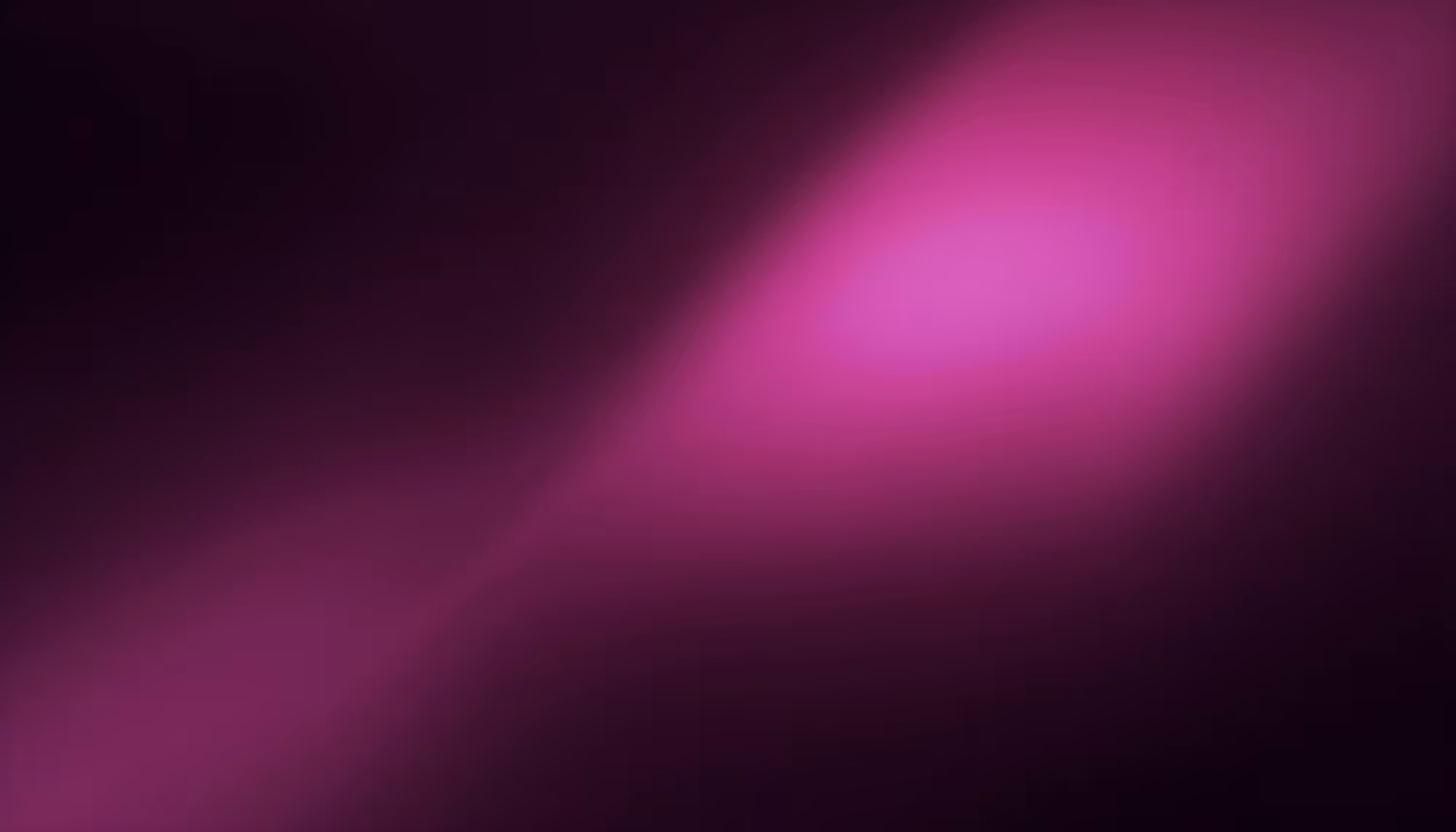 Abstract gradient background with soft glowing magenta and deep purple tones blending into dark near-black corners, creating a luminous, atmospheric effect.
