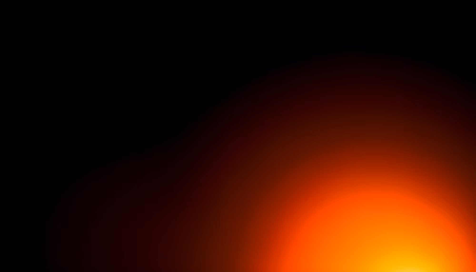 A dark background with a glowing orange and red light emanating from the lower right corner, fading into black toward the upper left.