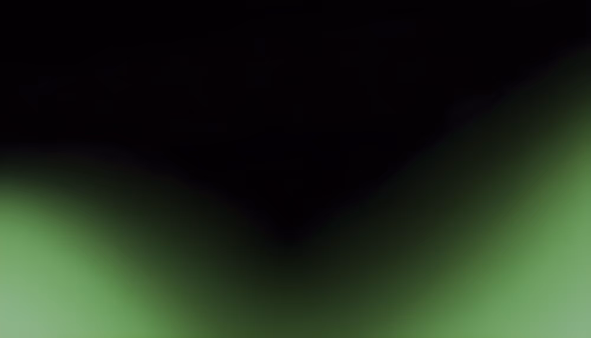 Abstract gradient background with soft green glow along the bottom and sides fading into deep black at the top and center.