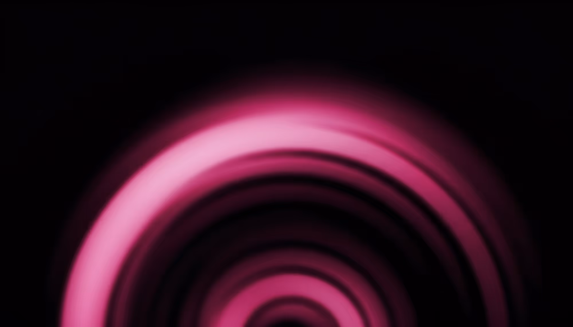 Glowing pink and magenta concentric arcs radiating outward against a black background, resembling a tunnel or portal with a luminous neon light effect.
