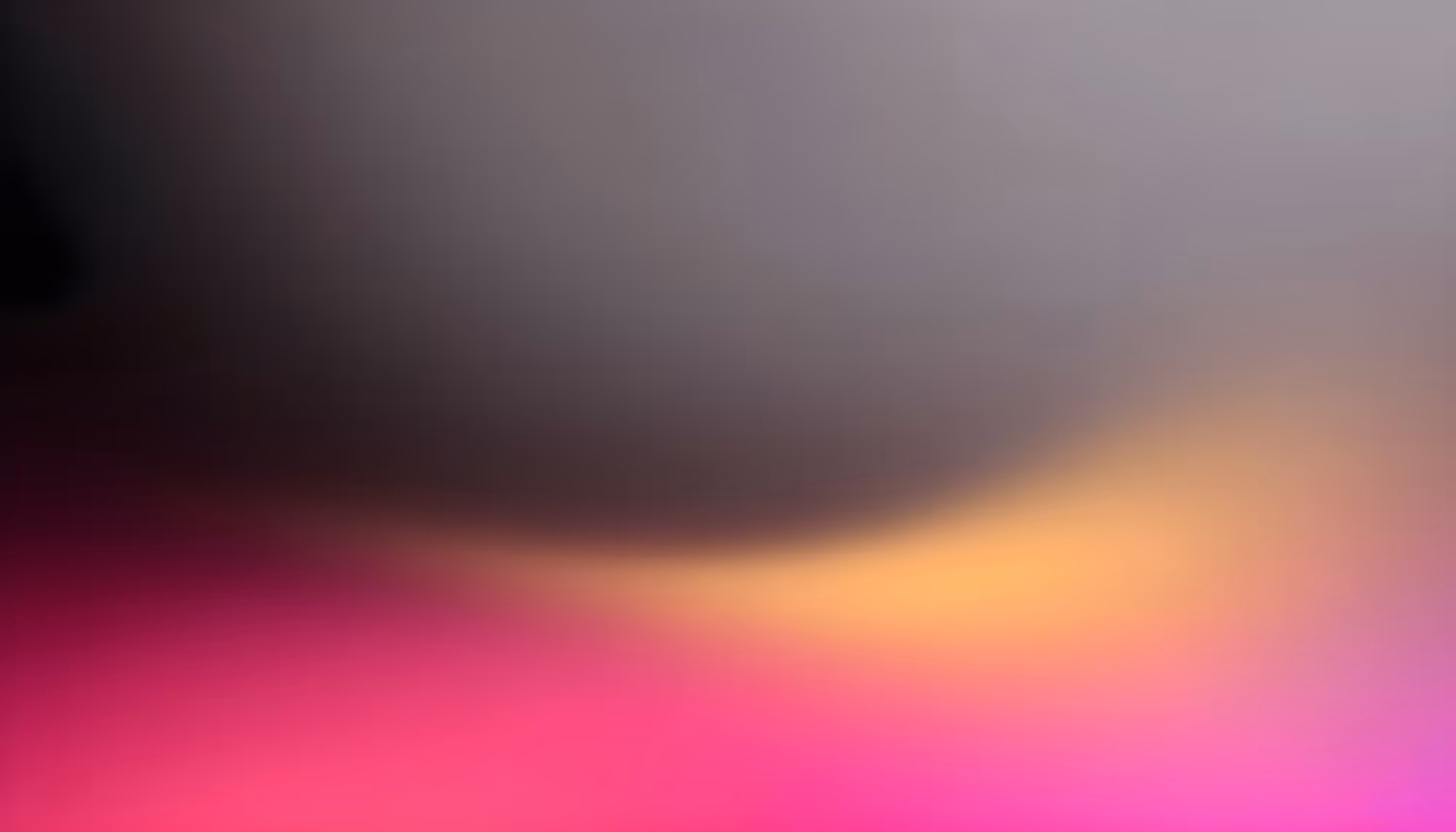 Abstract gradient background transitioning from deep black in the upper left through mid-tones of gray in the center, with a warm golden-yellow band sweeping across the middle, blending into vivid magenta and pink hues along the bottom edge, with a soft lavender tint in the lower right corner.