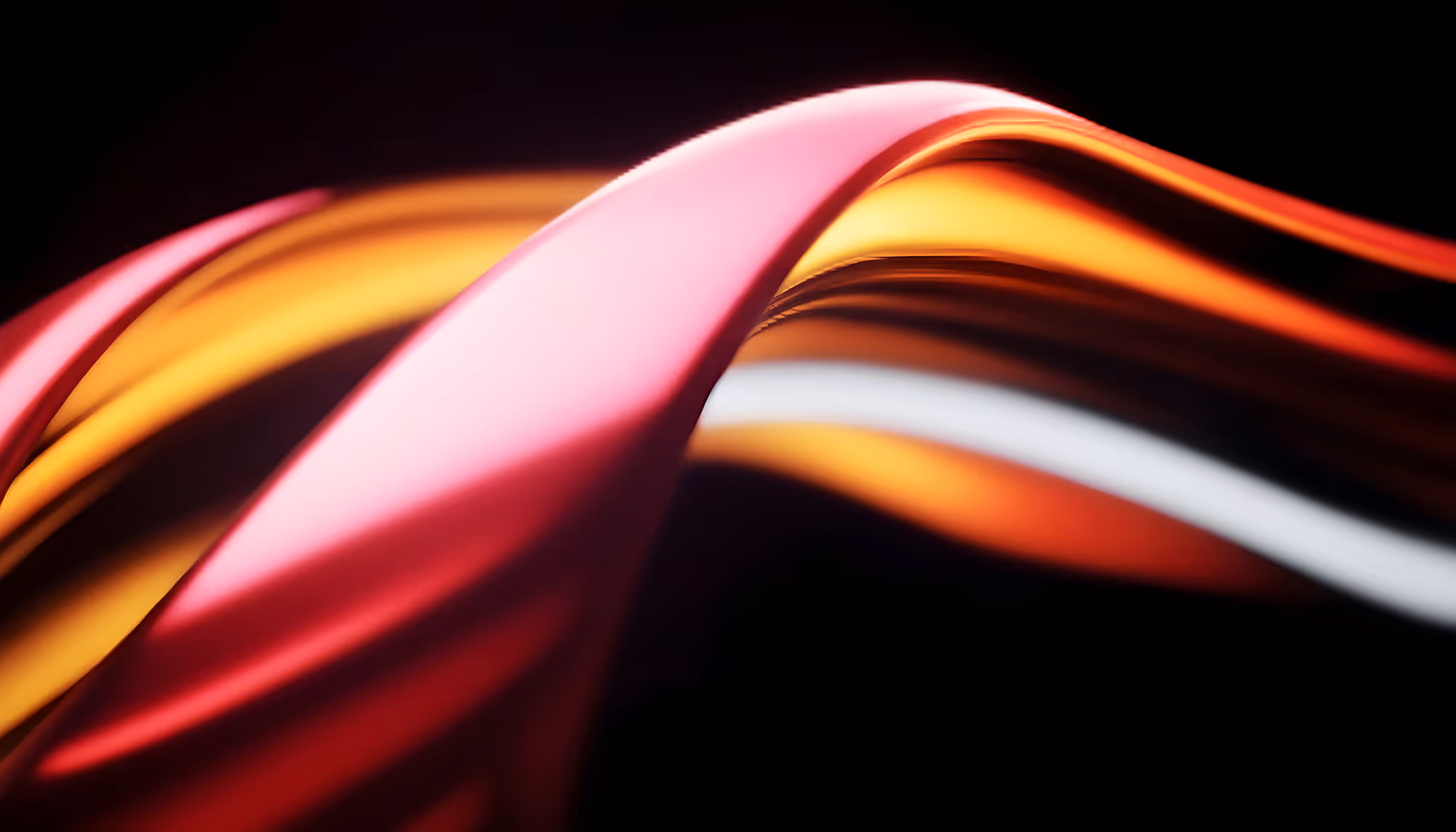 Abstract 3D render of intertwining glossy ribbons in shades of pink, red, orange, and gold, flowing gracefully against a dark black background, with smooth reflective surfaces and soft lighting highlighting their curves.