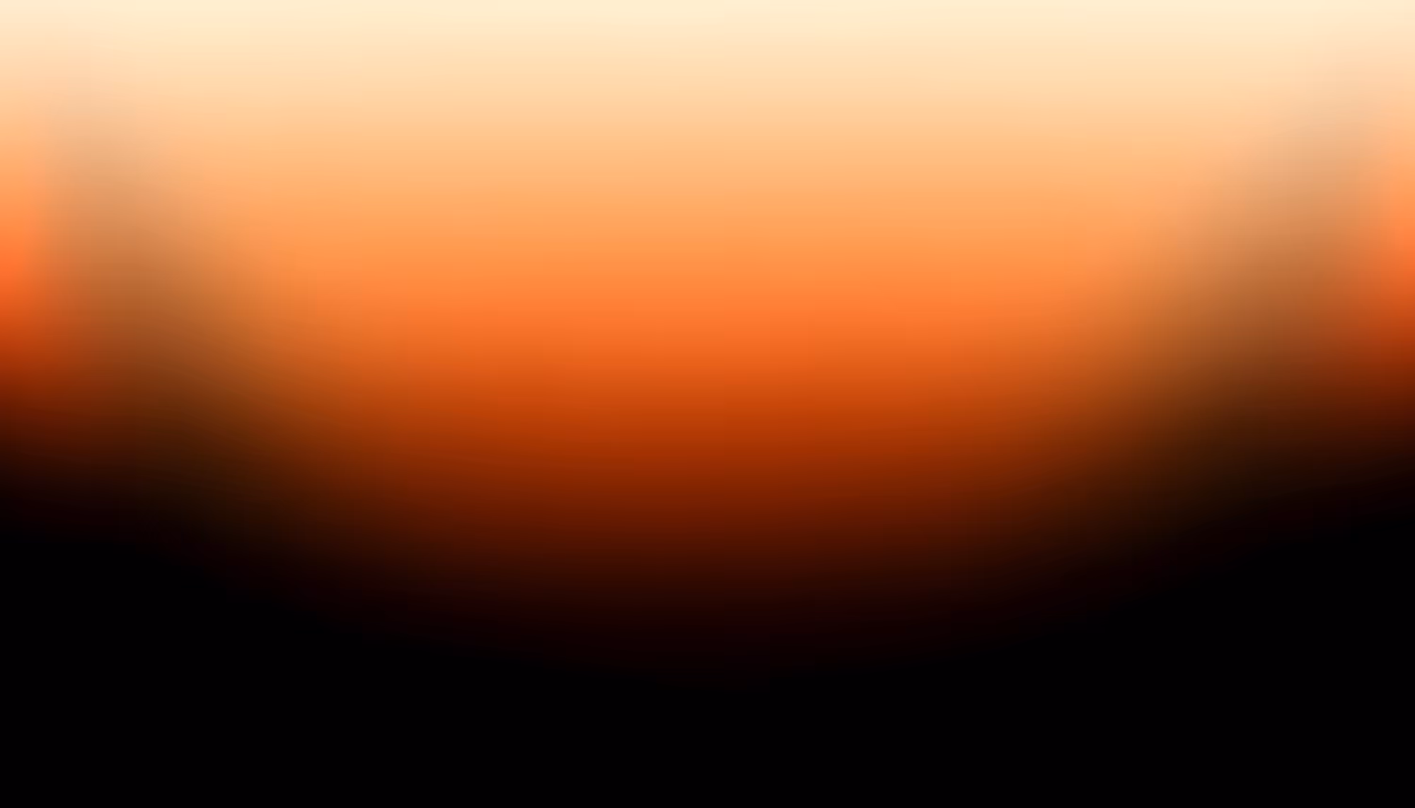 A soft gradient blending from warm cream and peach tones at the top through vibrant orange in the middle to deep brown and black at the bottom, resembling a sunset or ember glow.