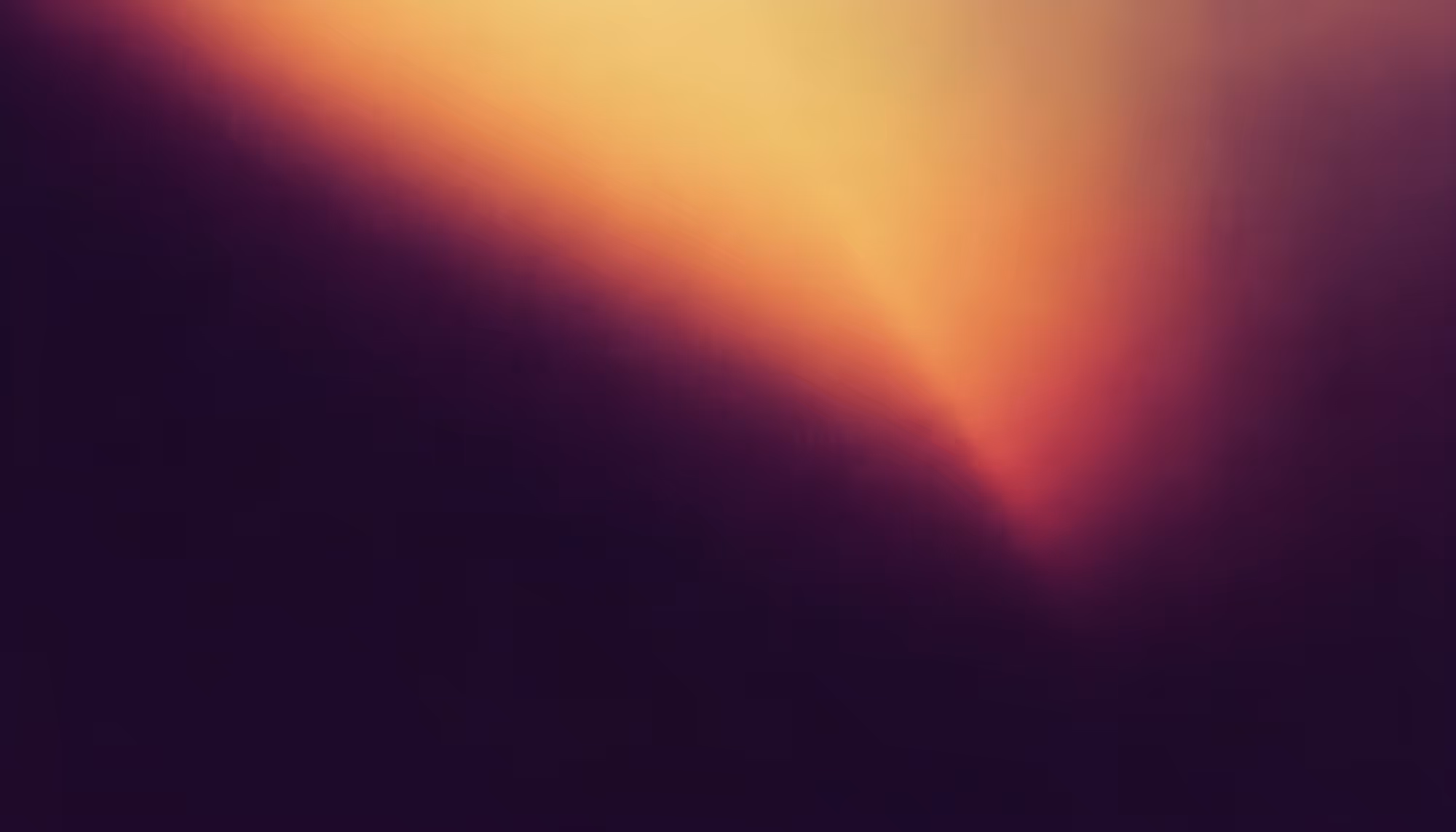 Abstract image with a gradient of dark purple at the bottom transitioning to a vibrant orange and pink at the top. The tone is serene and moody.