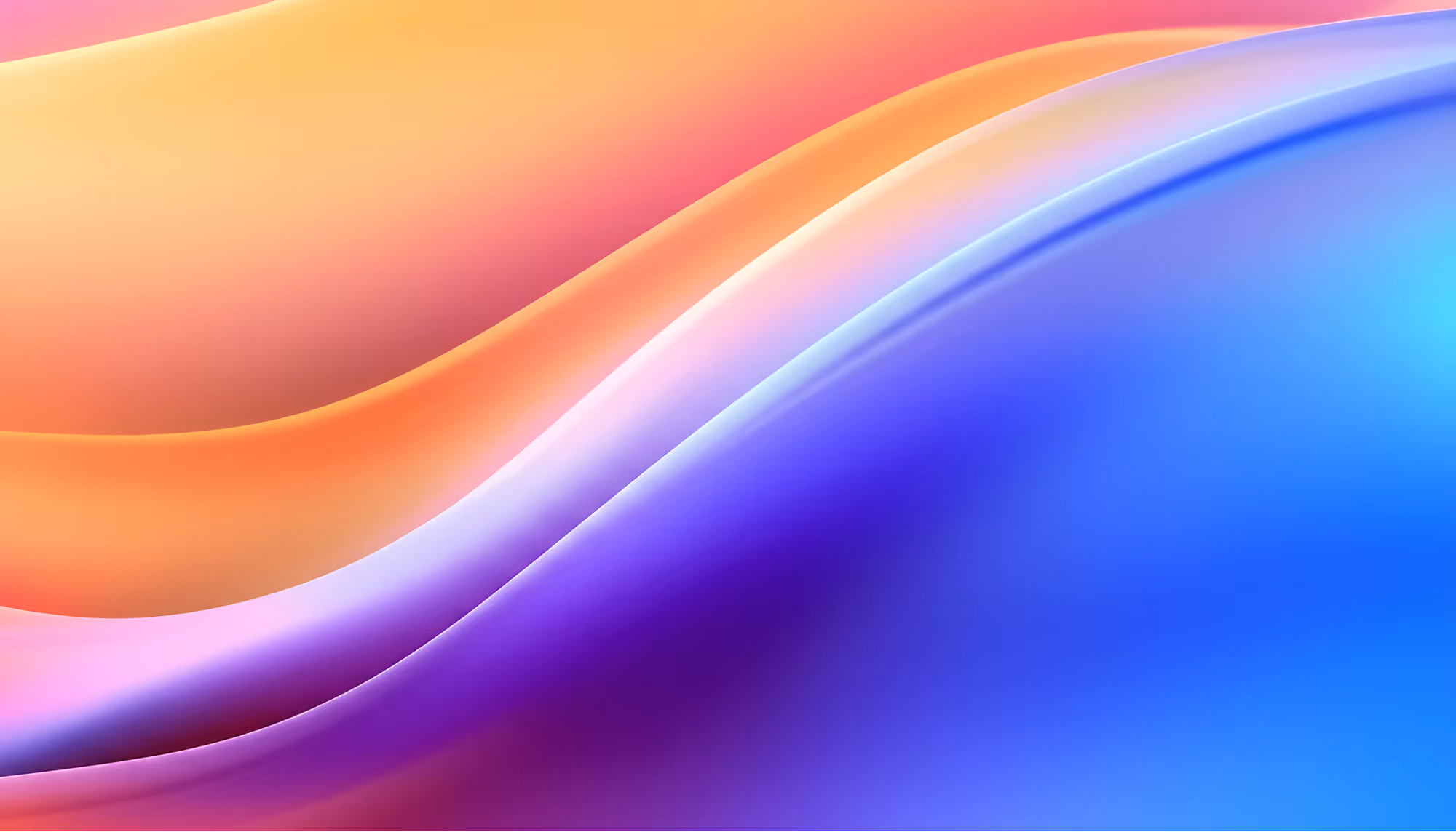 Abstract image featuring smooth, wavy gradients of orange, pink, purple, and blue. The flowing lines create a serene, harmonious, and vibrant atmosphere.