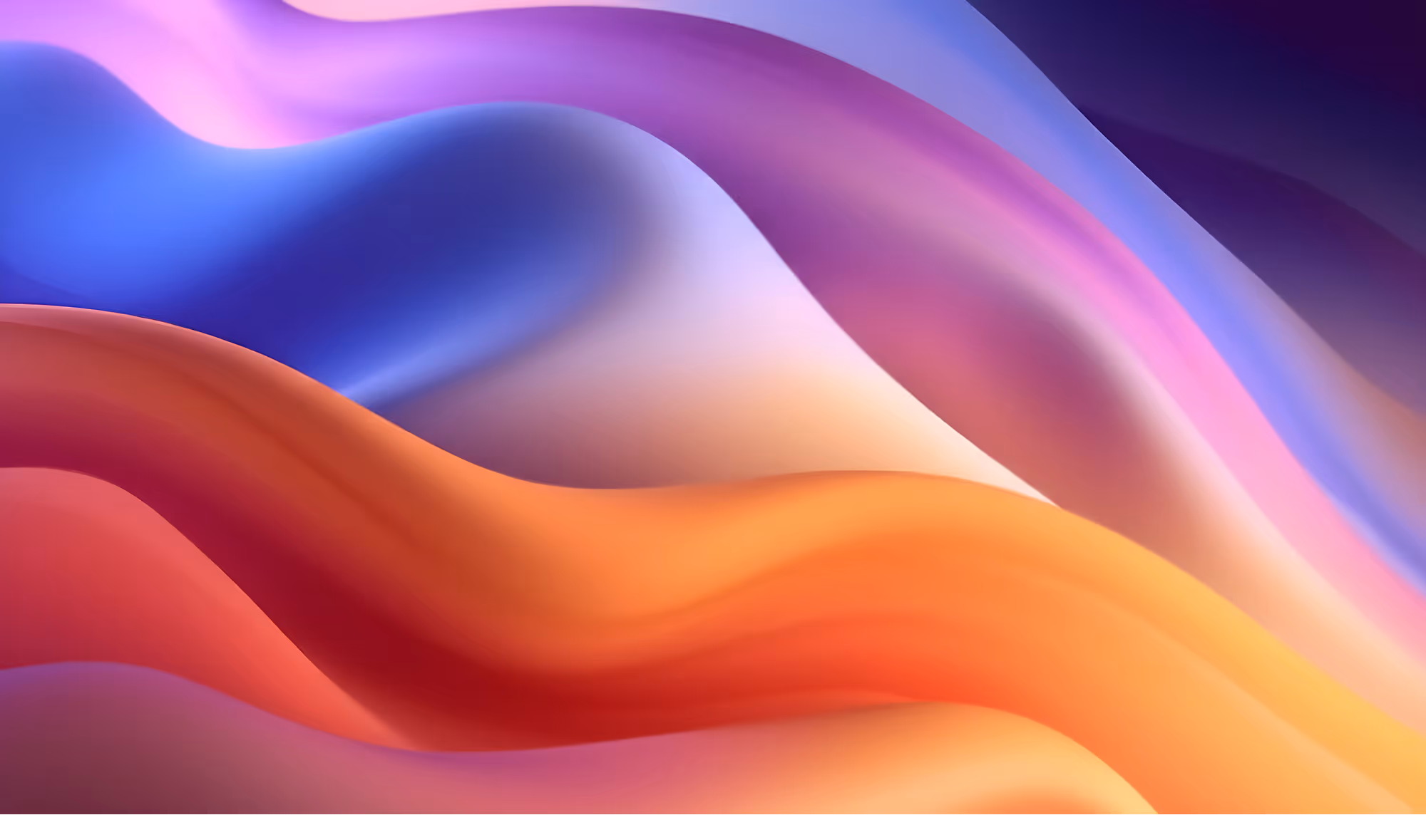 Abstract image of smooth, flowing waves in vibrant colors of blue, purple, pink, and orange, creating a serene and dynamic visual effect.