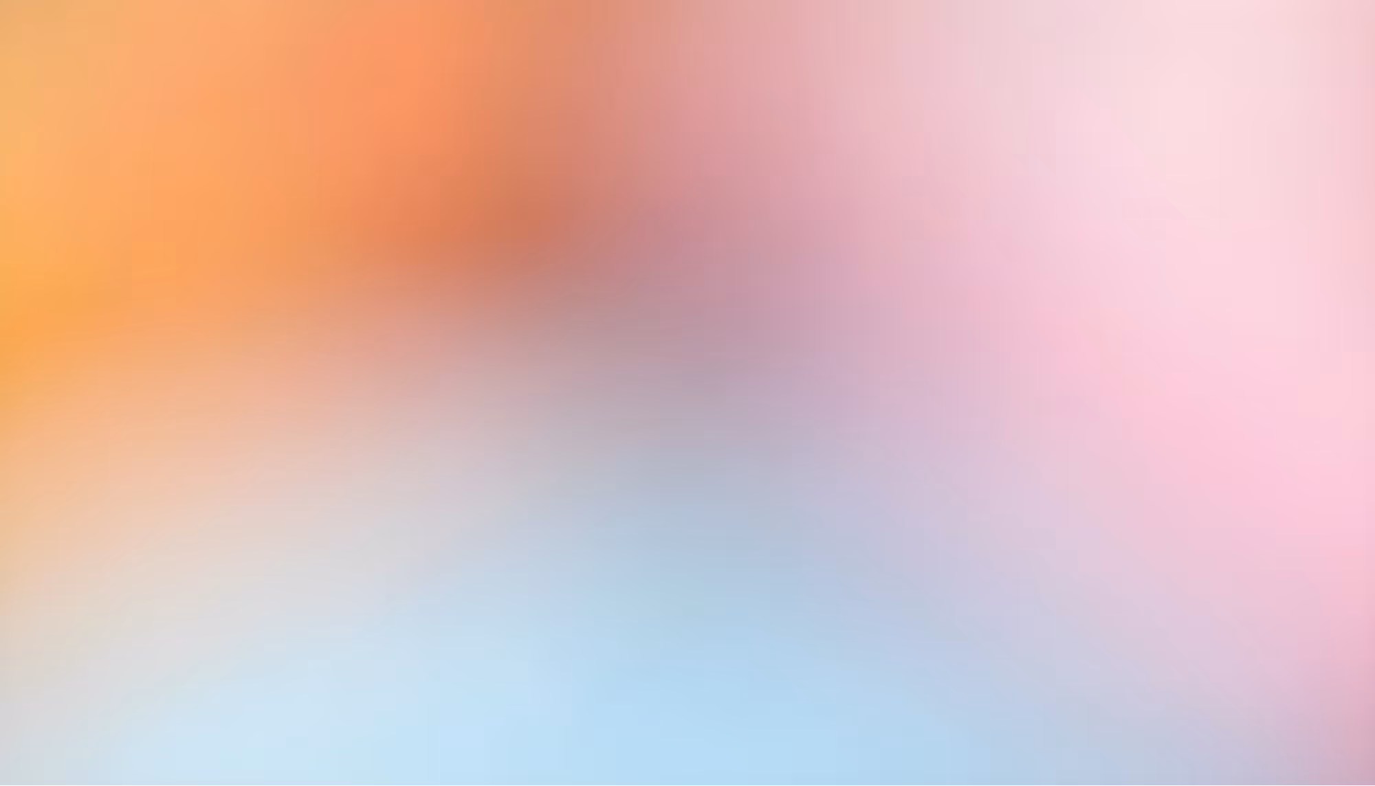 A soft, blurred gradient blends warm orange with cool blue and pink tones, creating a serene and soothing abstract background with gentle transitions.