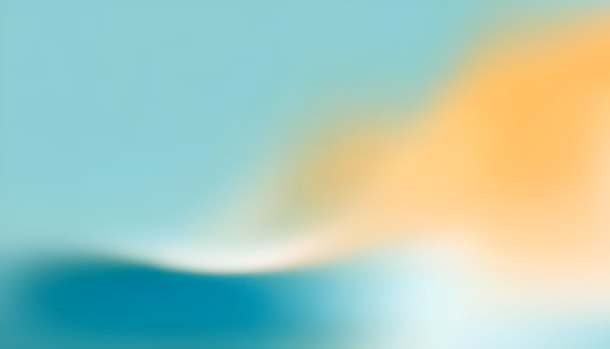 Abstract image with soft, blurred colors. A blue area fades into a warm orange, evoking a serene, calming atmosphere. No distinct shapes.