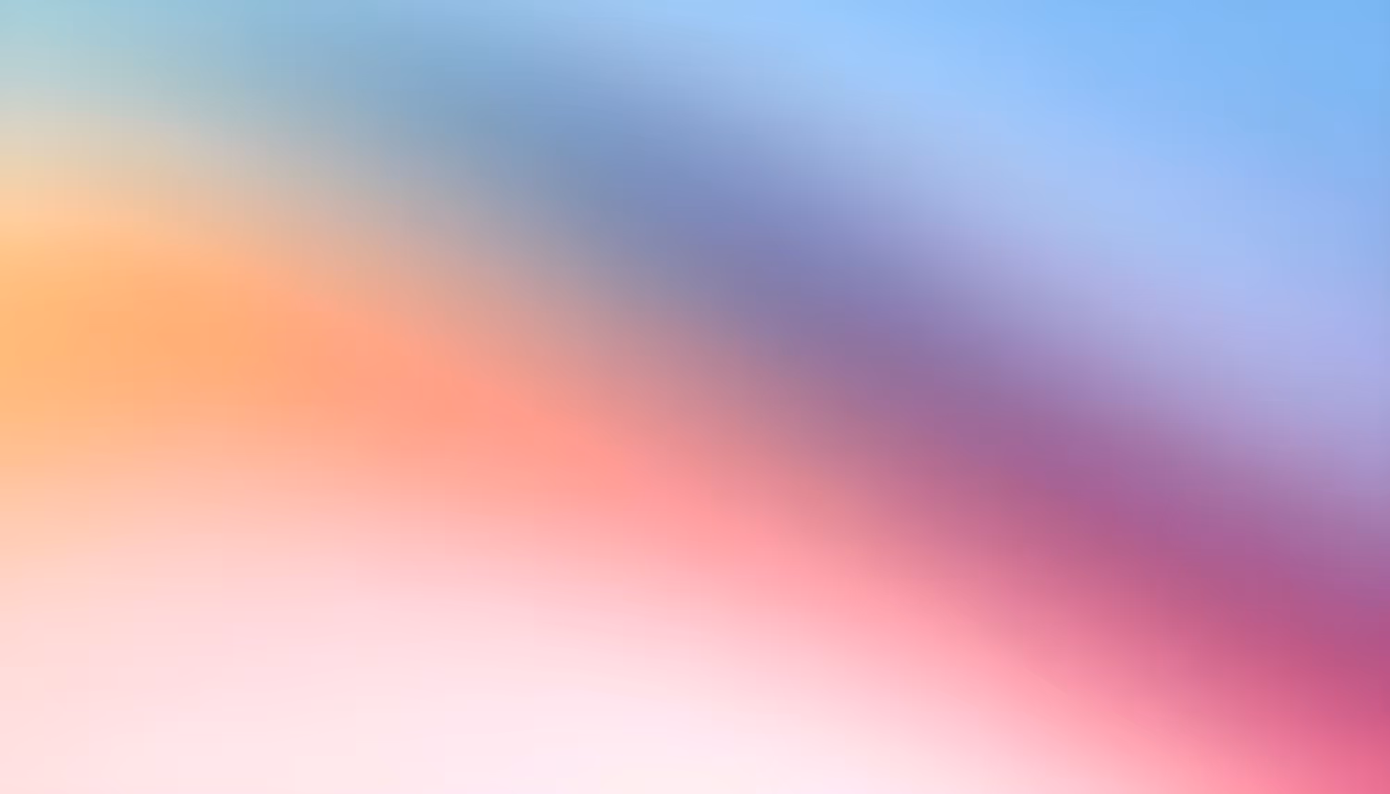 A soft, blurred gradient with pastel hues of blue, purple, orange, and pink, creating a calm and soothing abstract background.