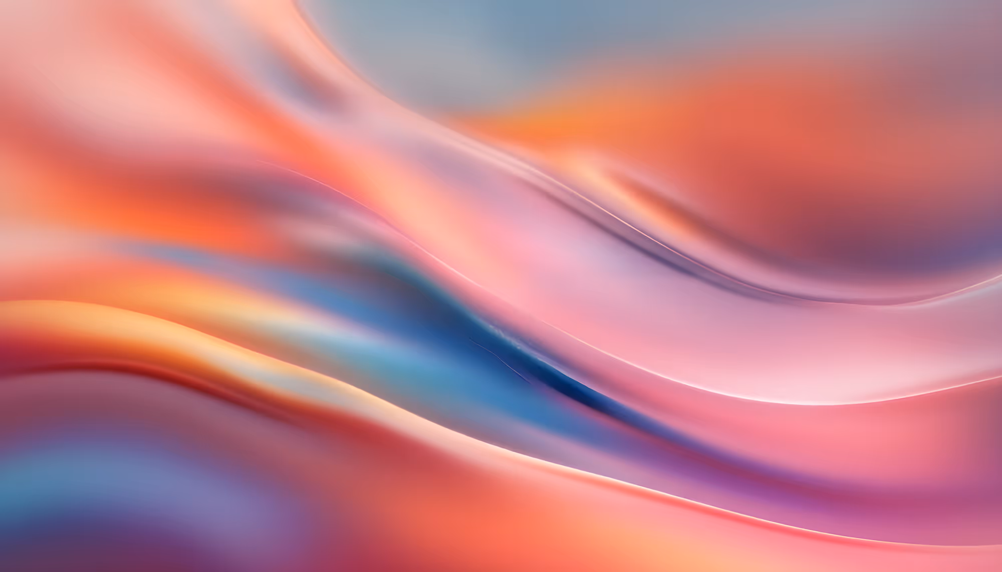 Abstract image featuring smooth, flowing waves of pink, orange, and blue hues. The blend of colors creates a calming, ethereal atmosphere.