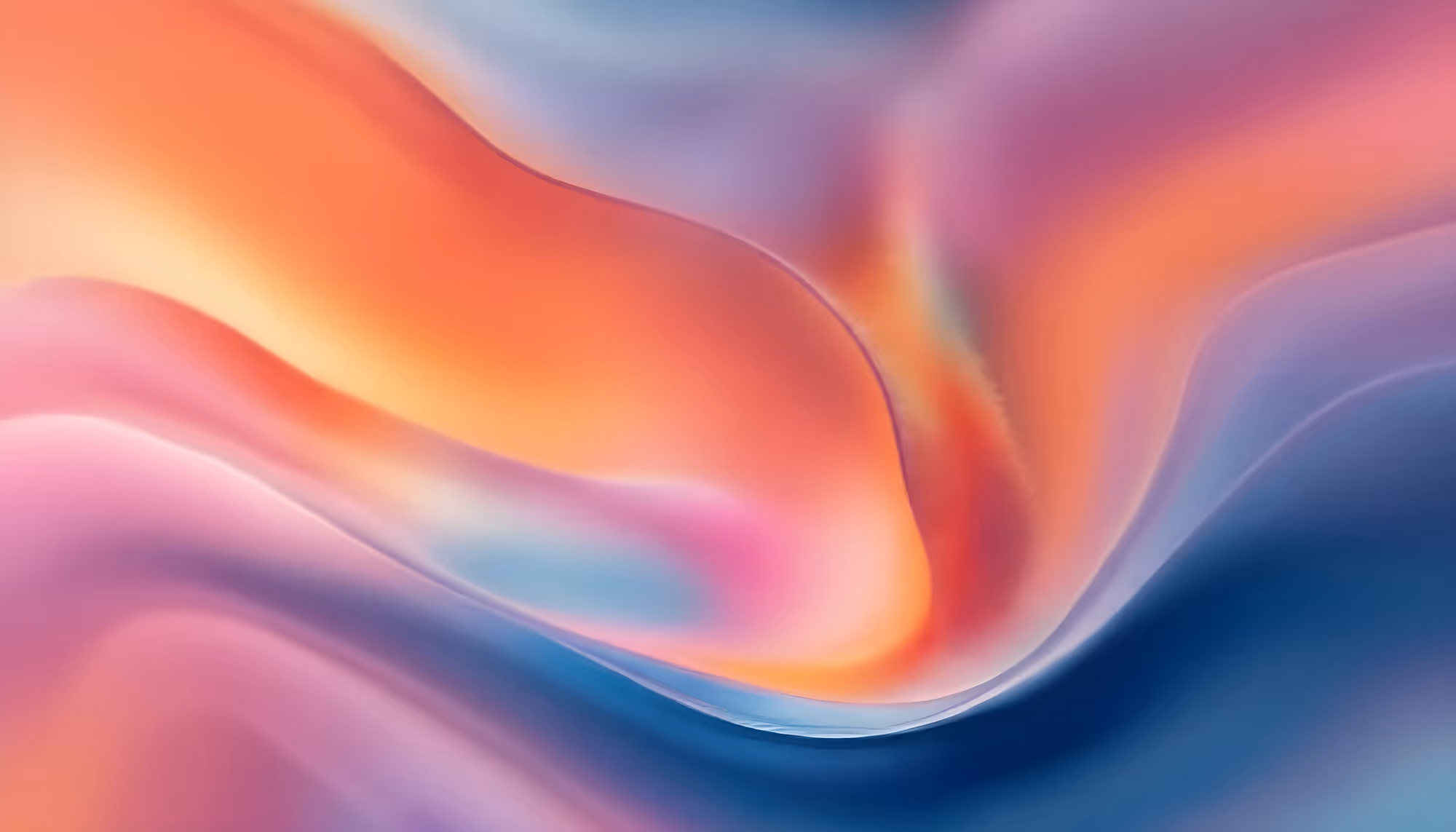Abstract image with smooth, flowing curves in vibrant colors of pink, orange, and blue. The soft blending creates a soothing, dreamy atmosphere.