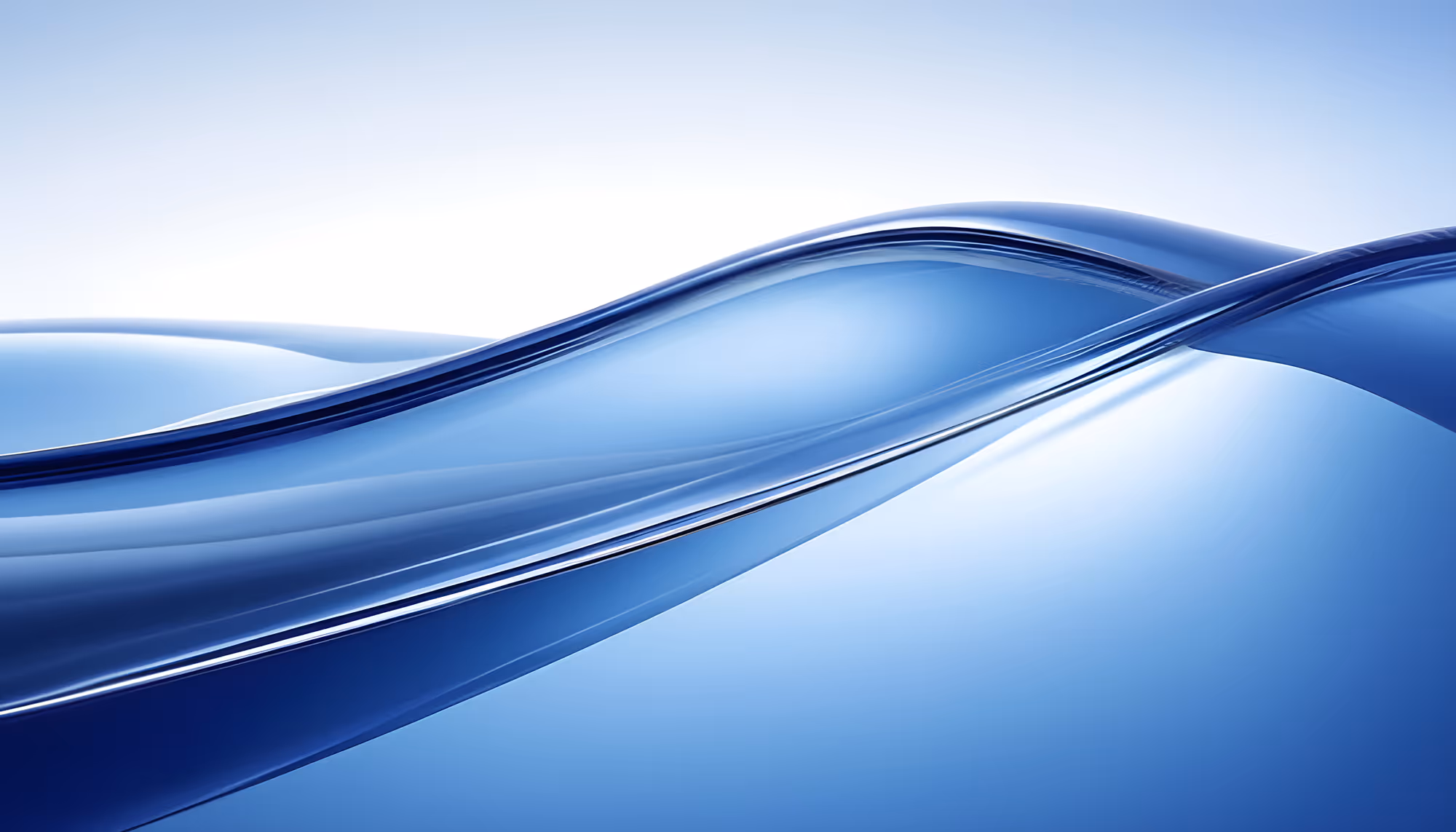 Smooth blue waves in a serene abstract design, with gentle curves and a gradient sky background, evoke calmness and fluidity.
