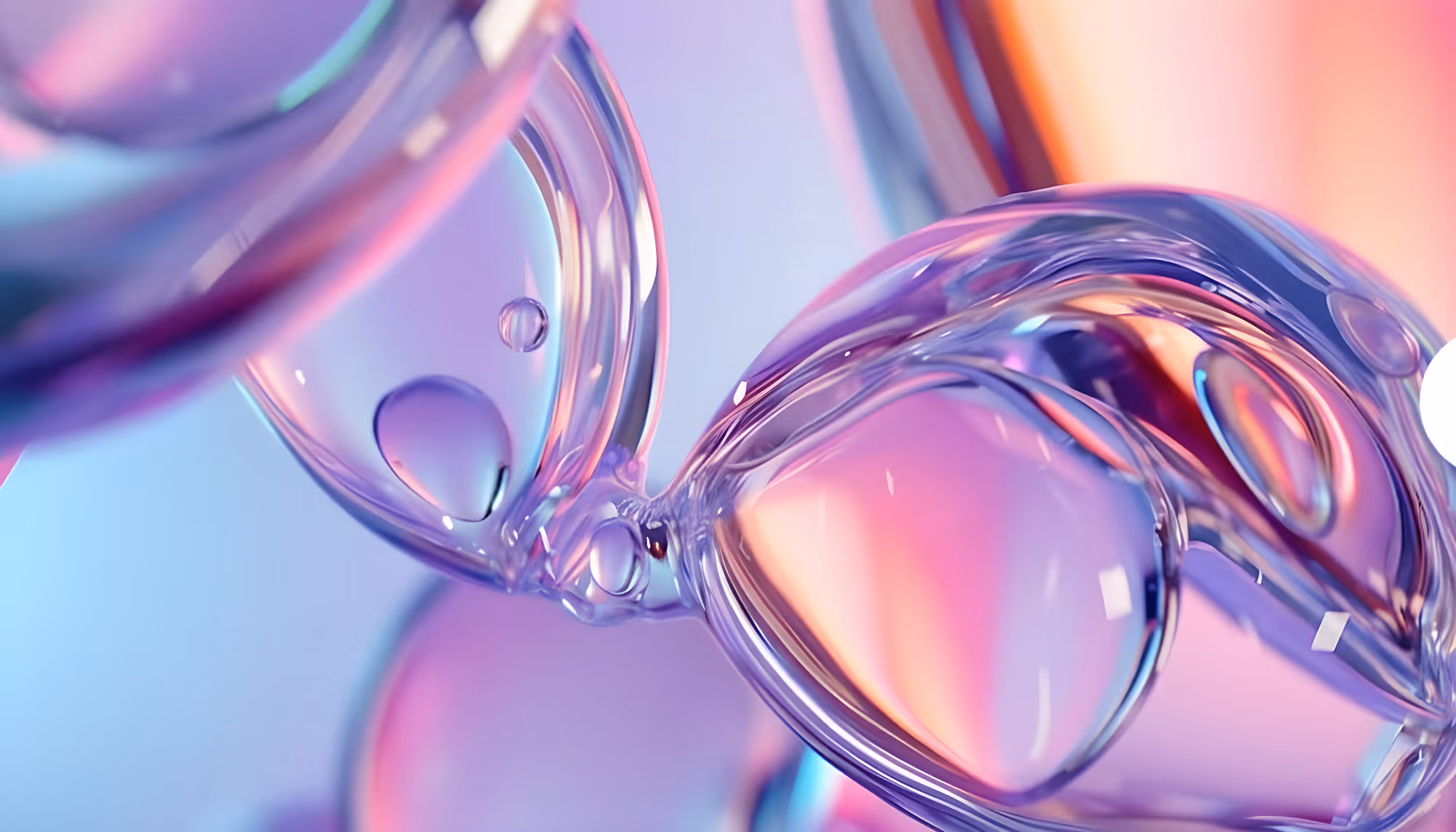 Abstract image featuring translucent, overlapping bubbles with pastel hues of pink, purple, and blue. The scene conveys a sense of fluidity and tranquility.