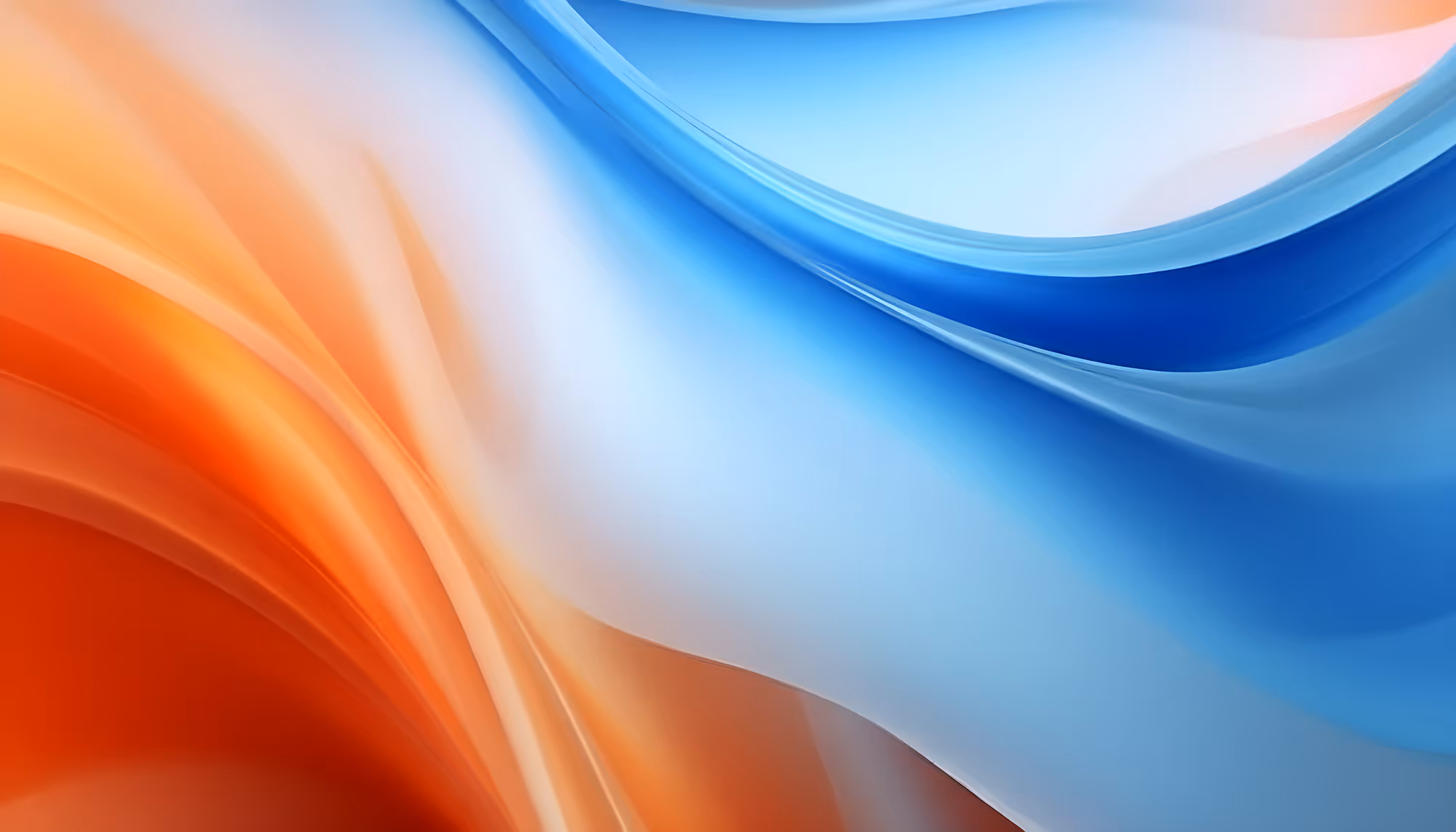 Abstract image with flowing waves of blue and orange hues blending smoothly. The soft curves and transitions evoke a calm, soothing feeling.