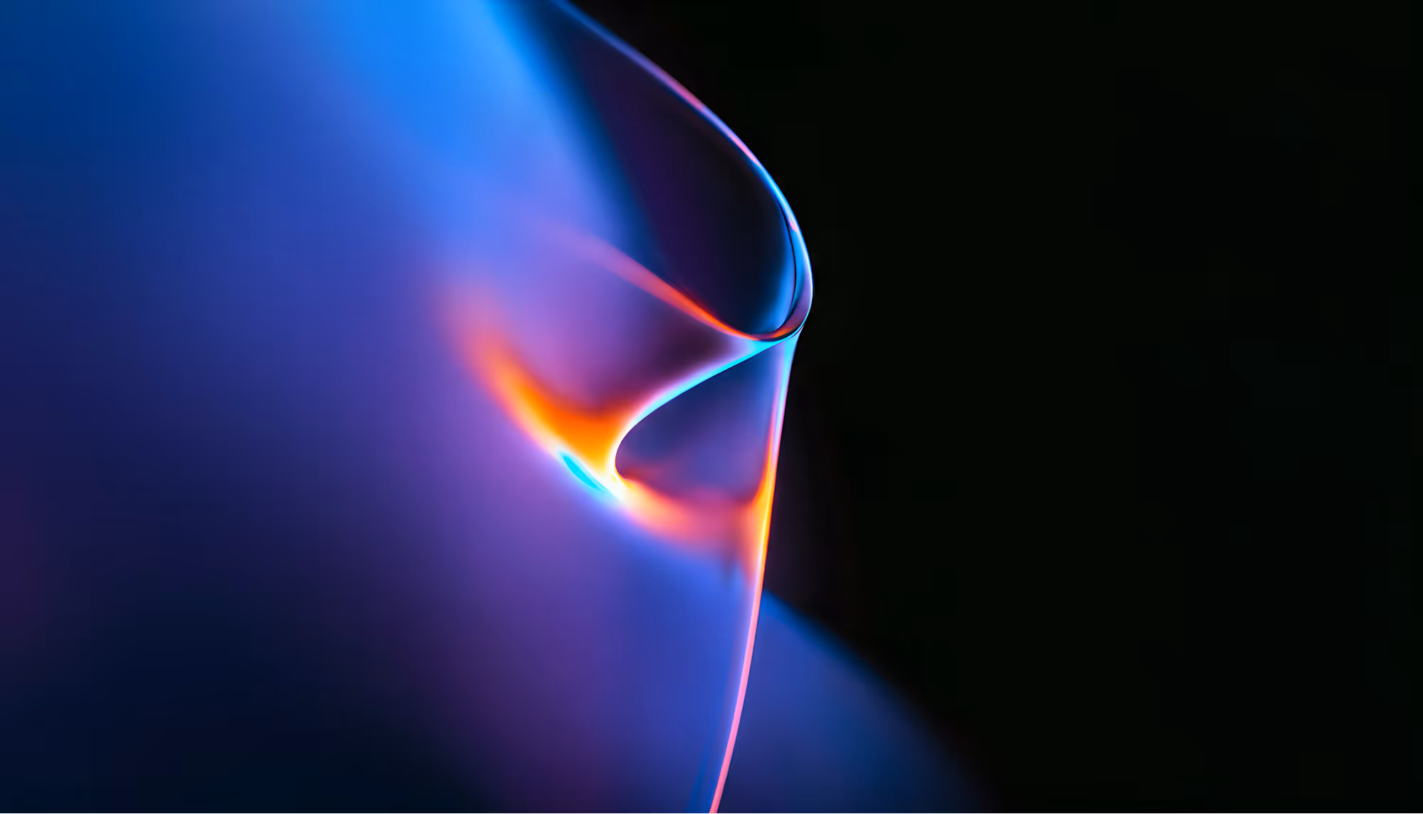 Abstract image featuring a smooth blend of vibrant blue, purple, and orange hues against a dark background. The flowy shapes create a sense of motion and serenity.