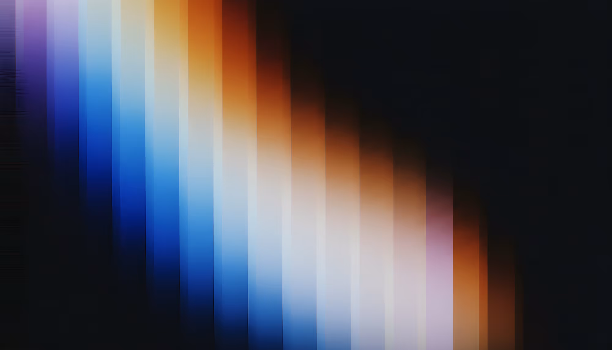 Abstract image with diagonal bands of color transitioning from cool blues to warm oranges and reds on a dark background, creating a gradient effect.
