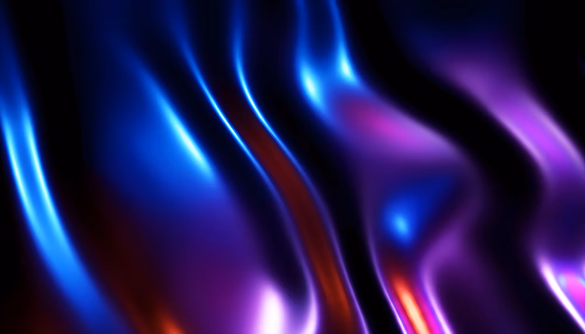 Abstract image featuring smooth, flowing lines in vibrant blue, purple, and red hues. The glossy texture creates a dynamic, futuristic feel.